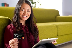 Young Woman Holding Credit Card